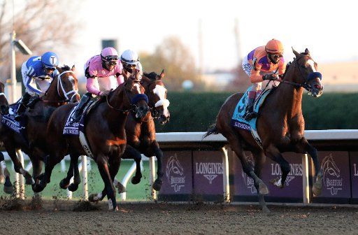 Jockey John Velazquez riding Authentic leads the field down the front stretch in the Breeders Cup Classic at Keeneland, Saturday, November 7, 2020 in Lexington, Kentucky. Photo by John Sommers II