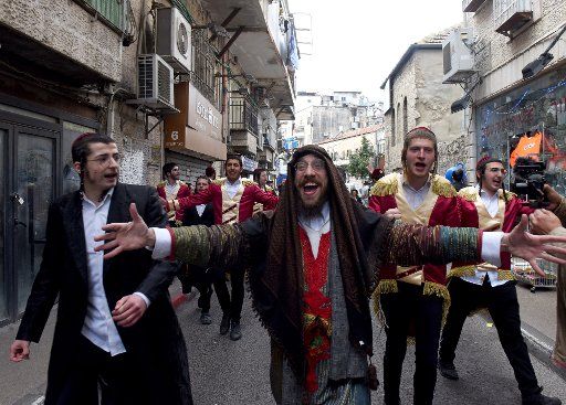 Ultra-Orthodox Jews dress in costumes to celebrate Purim in Mea Shearim in Jerusalem, on Sunday, March 28, 2021. Photo by Debbie Hill