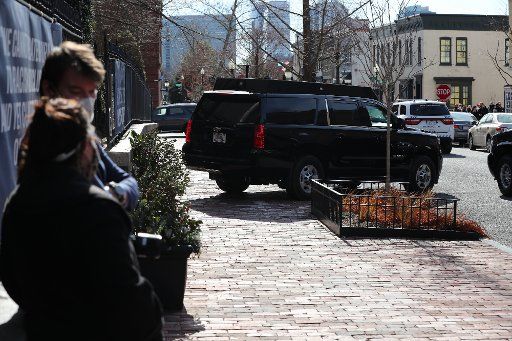 The motorcade of President Joe Biden heads to at Holy Trinity church in Georgetown in Washington, DC. on Sunday, January 24, 2021. Photo by Oliver Contreras
