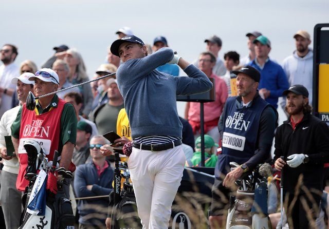 Justin Thomas of the USA tees off on the seventh hole on the first day of the Open Championship at Royal St George\