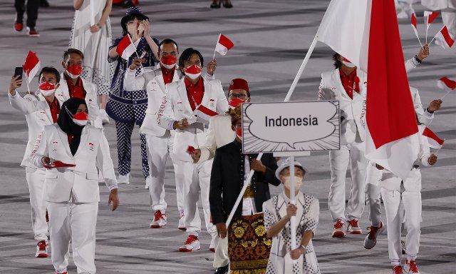 Indonesia marches during the 2020 Olympics Opening Ceremonies at Tokyo Olympics Stadium in Tokyo, Japan on Friday, July 23, 2021. Photo by Tasos Katopodis