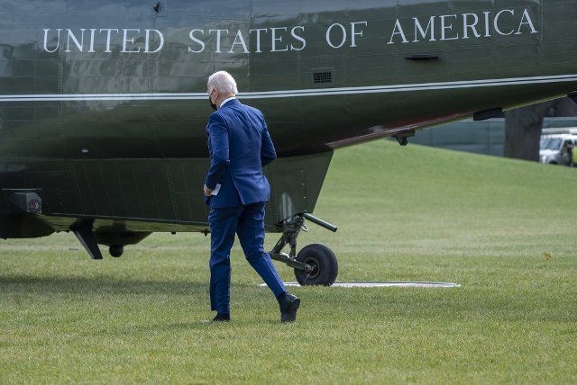 President Joe Biden walks to Marine One on the South Lawn of the White House en route Joint Base Andrews and onto Minneapolis-St. Paul, Minnesota. Photo by Ken Cedeno