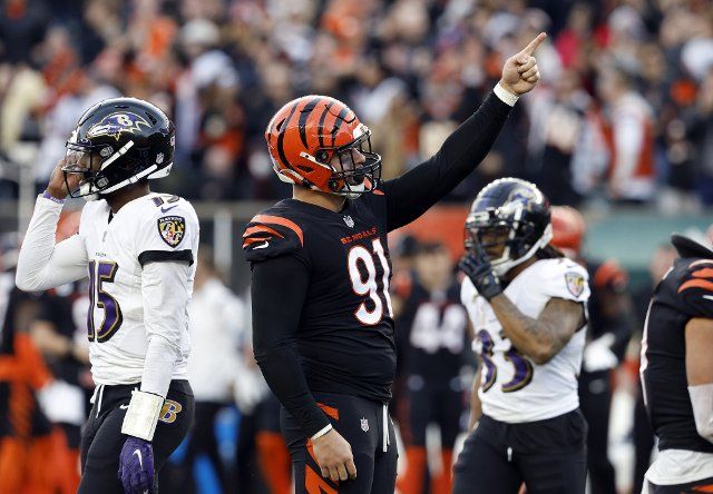 Cincinnati Bengals Trey Hendrickson (91) celebrates after holding the Baltimore Ravens on a fourth down play during the second half of play at Paul Brown Stadium in Cincinnati, Ohio, Sunday, December 26, 2021. Photo by John Sommers II 