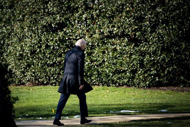 U.S, President Joe Biden walks on the South Lawn of the White House after arriving on Marine One in Washington, D.C., U.S., on Monday, Jan. 10, 2022. Biden over the weekend called for vigilance in protecting U.S. democracy as he seeks to rally Democrats behind voting-rights legislation. Photo by Al Drago