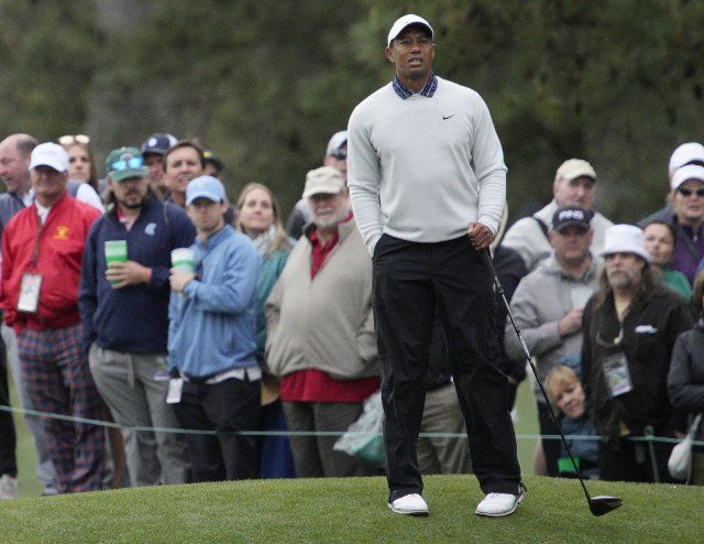 Tiger Woods checks the distance to the green on the 3rd hole on the third day of the Masters golf tournament at Augusta National Golf Club in Augusta, Georgia on Saturday, April 9, 2022. Photo by Bob Strong
