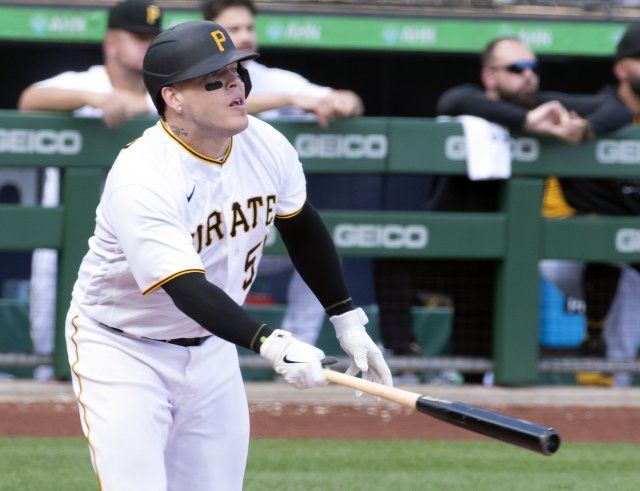 Pittsburgh Pirates catcher Roberto Perez (55) hits a ground rule double in the third inning of the Pirates Home Opener against the Chicago Cubs at PNC Park on Tuesday April 12, 2022 in Pittsburgh. Photo by Archie Carpenter