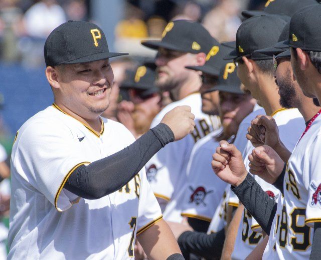 Pittsburgh Pirates first baseman Yoshi Tsutsugo (25) greets his teammates before the start of the Pirates Home Opener against the Chicago Cubs at PNC Park on Tuesday April 12, 2022 in Pittsburgh. Photo by Archie Carpenter