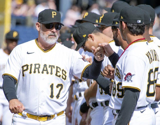 Pittsburgh Pirates manager Derek Shelton (17) greets his team before the start of the Pirates Home Opener against the Chicago Cubs at PNC Park on Tuesday April 12, 2022 in Pittsburgh. Photo by Archie Carpenter