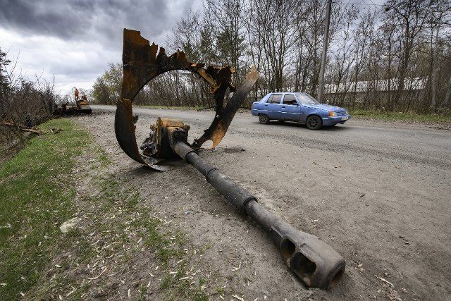 The cannon of a destroyed tank lies beside a highway during the ongoing Russian invasion of Ukraine,n the town of Borodianka, northwest of Kyiv, Ukraine, on Monday, April, 18 2022. Photo by Vladyslav Musiienko