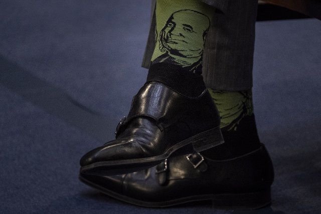 An image of Ben Franklin is shown on the socks of Patrick Jackson, husband of Supreme Court nominee Ketanji Brown Jackson during a Senate Judiciary Committee confirmation hearing on Capitol Hill in Washington DC, Monday, March 22, 2022. Jackson was nominated by President Joe Biden to fill Supreme Court Justice Stephen Breyer\
