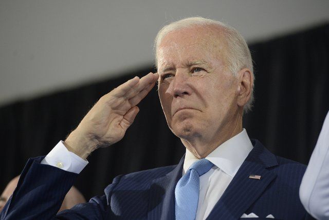 President Joe Biden salutes during a U.S. Coast Guard change of command ceremony at Coast Guard Headquarters in Washington, DC on Wednesday, June 1, 2022. Photo by Bonnie Cash