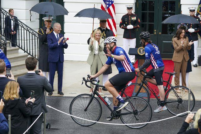 US President Joe Biden and First Lady Jill Biden participate in the annual wounded warrior Soldier Ride on the South Lawn of the White House in Washington, DC, on June 23, 2022. The annual Soldier Ride recognizes the service, sacrifice, and recovery journey for wounded, ill, and injured service members and veterans. Photo by Shawn Thew