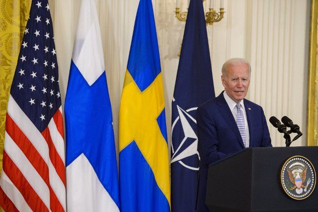 President Joe Biden speaks during a ceremony before signing ratification documents approving Finland and Sweden\