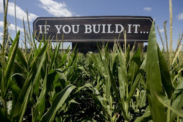 An "If You Build It" sign stand high above the mature corn for the annual MLB Field of Dreams game between the Cincinnati Reds and Chicago Cubs in Dyersville, Iowa, Wednesday, August 10, 2022. Photo by Mark Black