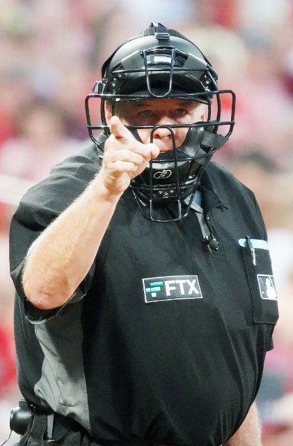 Home Plate Umpire Jerry Layne Calls a strike on Colorado Rockies Randal Grichuk in the sixth inning against the St. Louis Cardinals at Busch Stadium in St. Louis on Tuesday, August 16, 2022. Photo by Bill Greenblatt