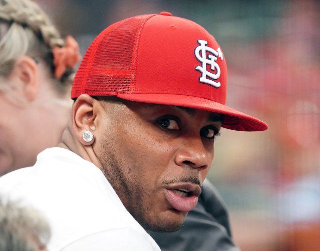 Rapper Nelly looks around while attending the Colorado Rockies-St. Louis Cardinals baseball game at Busch Stadium in St. Louis on Tuesday, August 16, 2022. Photo by Bill Greenblatt