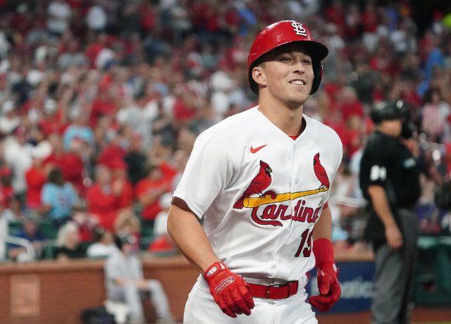 St. Louis Cardinals Tommy Edman smiles as he approaches the dugout after hitting a solo home run in the fourth inning against the Colorado Rockies at Busch Stadium in St. Louis on Tuesday, August 16, 2022. Photo by Bill Greenblatt