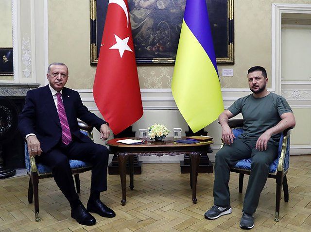Turkish President Tayyip Erdogan (L) and Ukrainian President Volodymyr Zelensky (C) meet in Lviv, Ukraine, on Thursday, August 18, 2022. Turkey\