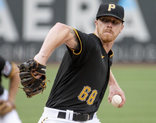 Pittsburgh Pirates relief pitcher Cam Vieaux throws in the eight inning of the 9-5 Cincinnati Reds win at PNC Park on Sunday, August 21, 2022 in Pittsburgh. Photo by Archie Carpenter