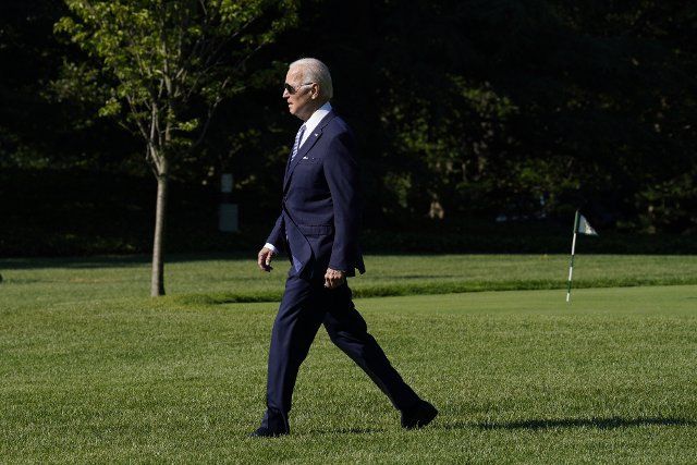 President Joe Biden walks across the South Lawn while departing the White House in Washington, DC to attend G7 summit in Krun, Germany on Friday, June 25, 2022. Photo by Yuri Gripas