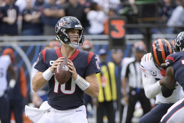 Houston Texans quarterback Davis Mills (10) looks of an open receiver during a game against the Chicago Bears at Soldier Field in Chicago on Sunday, September 25, 2022. Photo by Mark Black