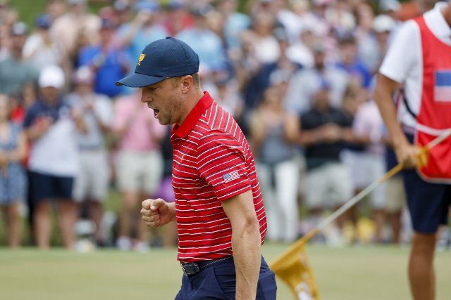 Justin Thomas reacts after winning the hole on the 15th hole as the United States wins the Presidents Cup golf championship in Charlotte, North Carolina on Sunday, September 25, 2022. Photo by Nell Redmond