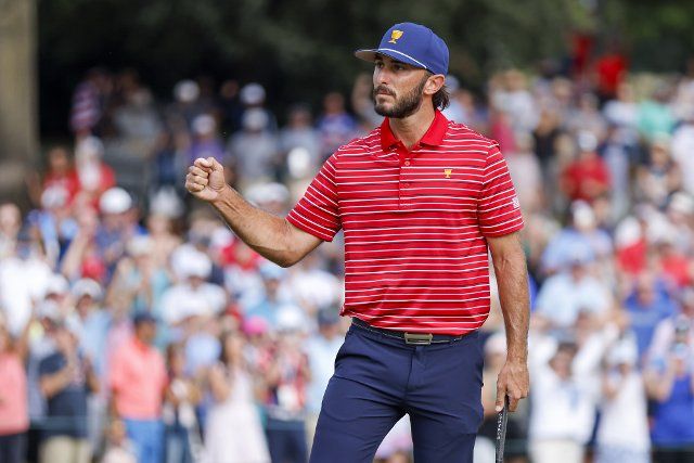 Max Homa reacts after winning the hole on the 15th hole as the United States wins the Presidents Cup golf championship in Charlotte, North Carolina on Sunday, September 25, 2022. Photo by Nell Redmond