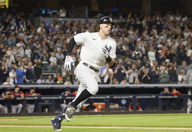 New York Yankees Aaron Judge hits a double in the first inning against the Boston Red Sox at Yankee Stadium in New York City on Sunday, September 25, 2022. Judge is one home run away from tying the American League and Yankees club record with 61 home runs set by Roger Maris. Photo by John Angelillo