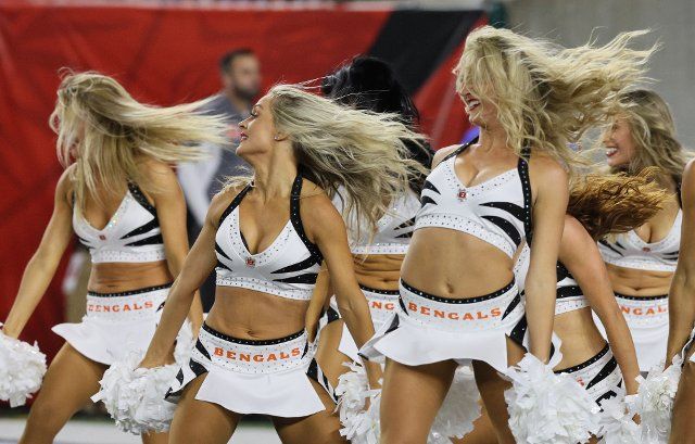 Cincinnati Bengals cheerleaders cheer for their team against the Miami Dolphins during the first half of play at Paycor Stadium, Thursday, September 29, 2022 in Cincinnati, Ohio. Photo by John Sommers II