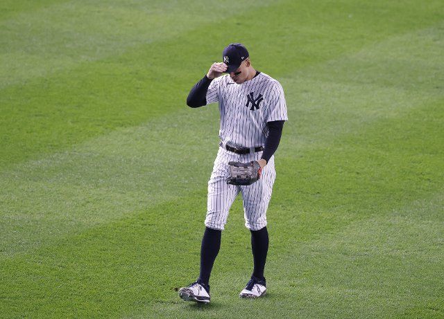 New York Yankees Aaron Judge warms up before the first inning against the Baltimore Orioles at Yankee Stadium in New York City on Friday, September 30, 2022. Judge is one home run away from breaking Roger Maris\