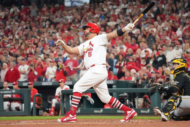 St. Louis Cardinals Albert Pujols swings, hitting his 701 career home run against the Pittsburgh Pirates in the fourth inning at Busch Stadium in St. Louis on Friday, September 30, 2022. Photo by Bill Greenblatt