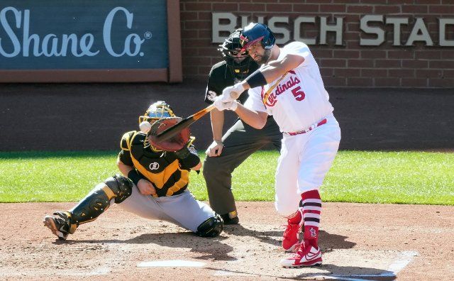 St. Louis Cardinals Albert Pujols swings, hitting a solo home run, his 702 career home run, in the third inning against the Pittsburgh Pirates at Busch Stadium in St. Louis on Sunday, October 2, 2022. The at bat is Pujols\