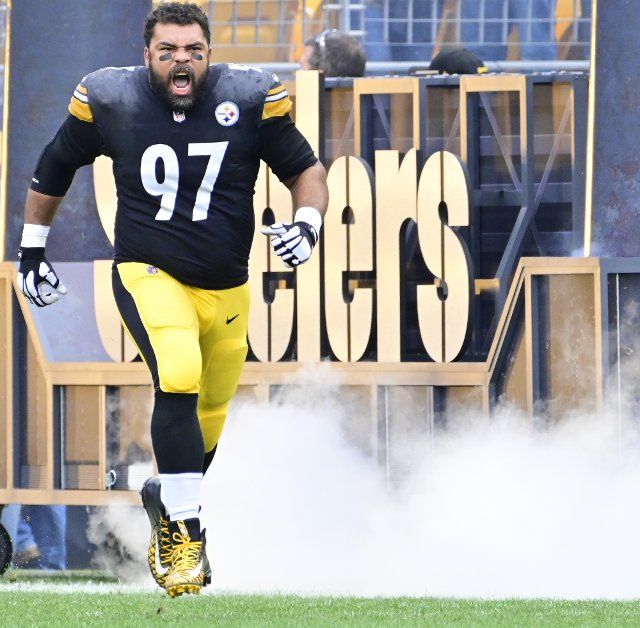 Pittsburgh Steelers defensive tackle Cameron Heyward (97) races onto the field before the start of the New York Jets 24-20 win against the Pittsburgh Steelers at Acrisure Stadium on Sunday, October 2, 2022 in Pittsburgh. Photo by Archie Carpenter