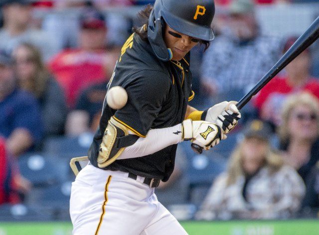 Pittsburgh Pirates second baseman Ji Hwan Bae (71) is hit by a pitch in the third inning against the St. Louis Cardinals at PNC Park on Wednesday October, 5 2022 in Pittsburgh. Photo by Archie Carpenter