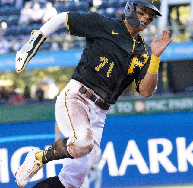 Pittsburgh Pirates second baseman Ji Hwan Bae (71) rounds third base on his way to scoring in the third inning against the St. Louis Cardinals at PNC Park on Wednesday October, 5 2022 in Pittsburgh. Photo by Archie Carpenter