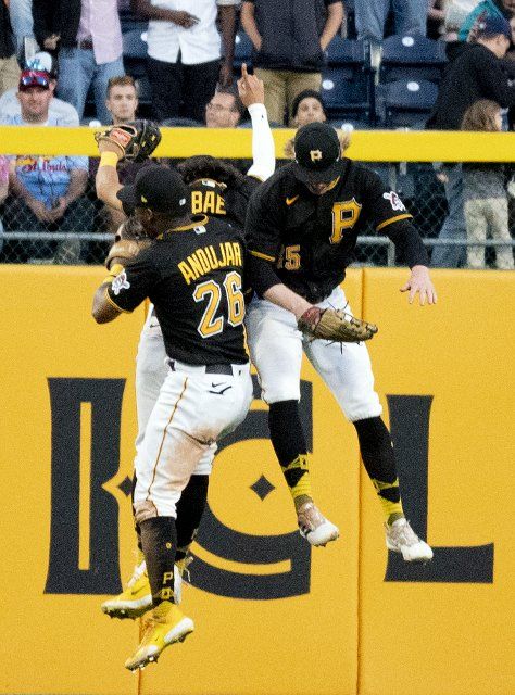 Pittsburgh Pirates outfielders celebrate the 5-3 win against the St. Louis Cardinals at PNC Park on Wednesday October, 5 2022 in Pittsburgh. Photo by Archie Carpenter
