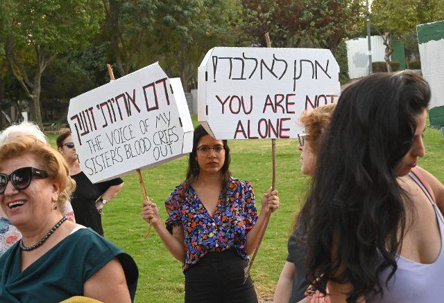 Israelis hold placards in support of Iranian woman Mahsa Amini during a solidarity protest in Jerusalem on Thursday, October 6, 2022. Amini, 22, died after detained by the morality police in Iran. Photo by Debbie Hill