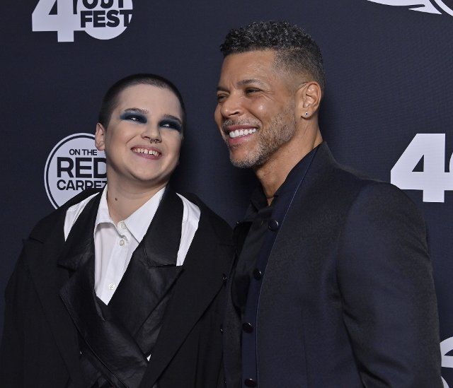 Blu del Barrio (L) and Wilson Cruz attend the Outfest Legacy Awards gala at Paramount Studios in Los Angeles on Saturday, October 22, 2022. Photo by Jim Ruymen