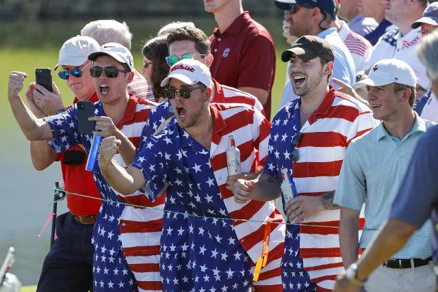 Fans cheer for the USA at the Presidents Cup golf championship in Charlotte, North Carolina on Friday, September 23, 2022. Photo by Nell Redmond\/UPI