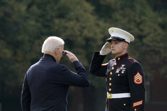 U.S. President Joe Biden salutes to a Marine as he departs from Fort McNair Washington en route Wilmington, Delaware on Saturday, September 24, 2022. Photo by Yuri Gripas