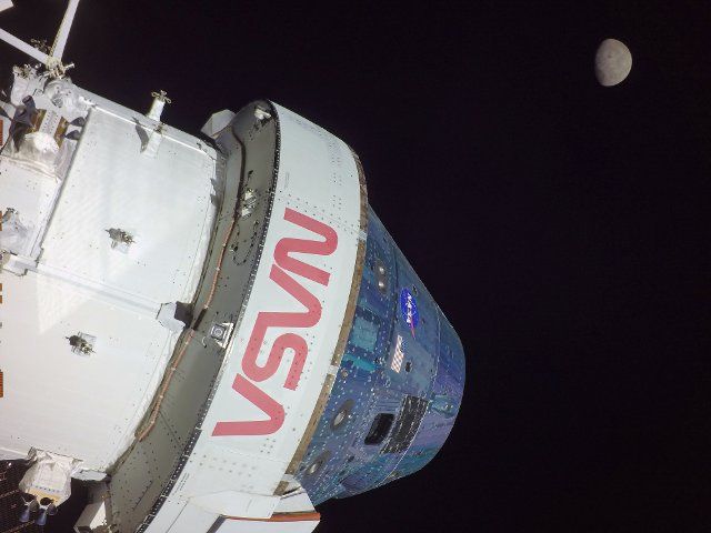 Taken on November 20, 2022, the fifth day of the Artemis I mission, this photo showing the Orion spacecraft with the Moon beyond was captured by a camera on the tip of one of Orion\
