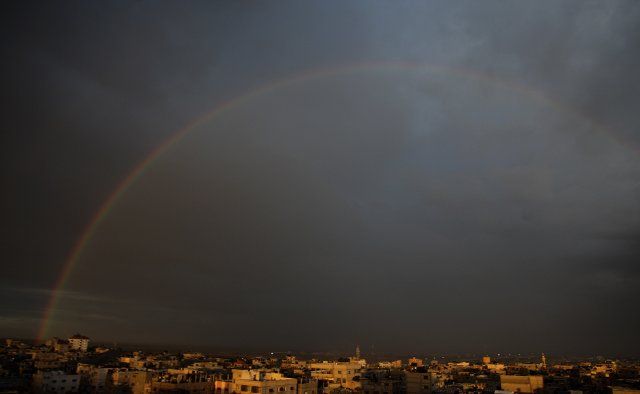 A rainbow appears over Gaza City on a rainy day on Saturday, November 26, 2022. Photo by Ismael Mohamad