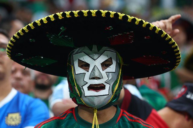 A Mexico fan looks on during the 2022 FIFA World Cup Group C match at Lusail Stadium in Doha, Qatar on November 26, 2022. Photo by Chris Brunskill