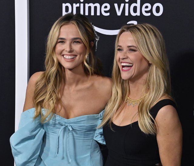 Cast member Zoey Deutch (L) and producer Reese Witherspoon attend the premiere of Prime Video\