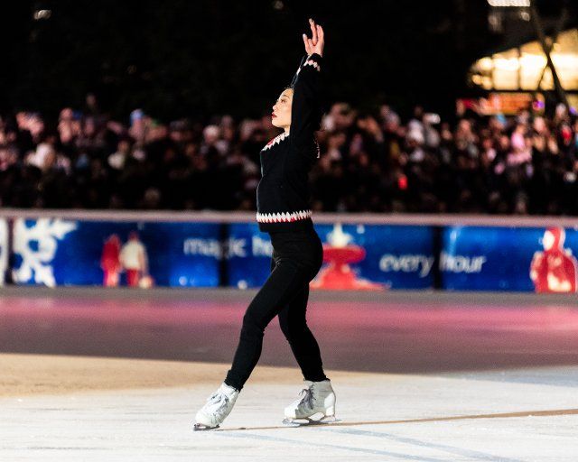 2018 U.S. Olympic Silver Medalist Mirai Nagasu performs at the tree lighting ceremony in Bryant Park in New York City on Tuesday, November 29, 2022. Photo by Gabriele Holtermann