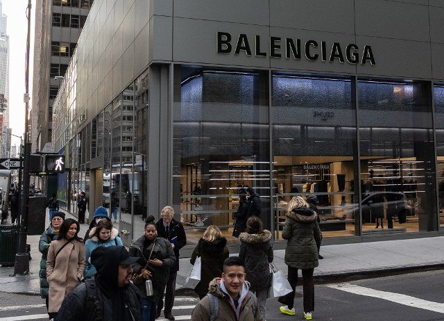 Pedestrians walk past the Balenciaga flagship store in New York City on Tuesday, November 29, 2022. The luxury retailer has come under fire over two ad campaigns. Photo by Gabriele Holtermann