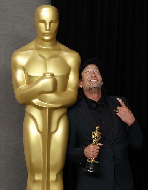 Troy Kotsur, winner of Best Actor in a Supporting Role for "CODA," appears backstage with his Oscar during the 94th annual Academy Awards at Loews Hollywood Hotel in the Hollywood section of Los Angeles, California on Sunday, March 27, 2022. Photo by John Angelillo