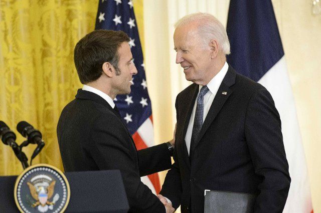 President Joe Biden and President of France Emmanuel Macron shake hands after a joint press conference in the East Room of the White House in Washington, DC on Thursday, December 1, 2022. Photo by Bonnie Cash