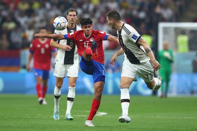 Yeltsin Tejeda (L) of Costa Rica in action with Niklas Sule of Germany during the 2022 FIFA World Cup Group E match at Al Bayt Stadium in Doha, Qatar on December 01, 2022. Photo by Chris Brunskill