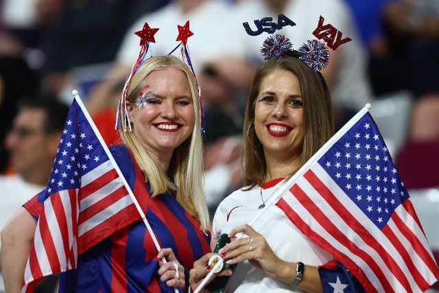 USA fans support their team during the 2022 FIFA World Cup Round of 16 match at Khalifa International Stadium in Doha, Qatar on December 03, 2022. Photo by Chris Brunskill